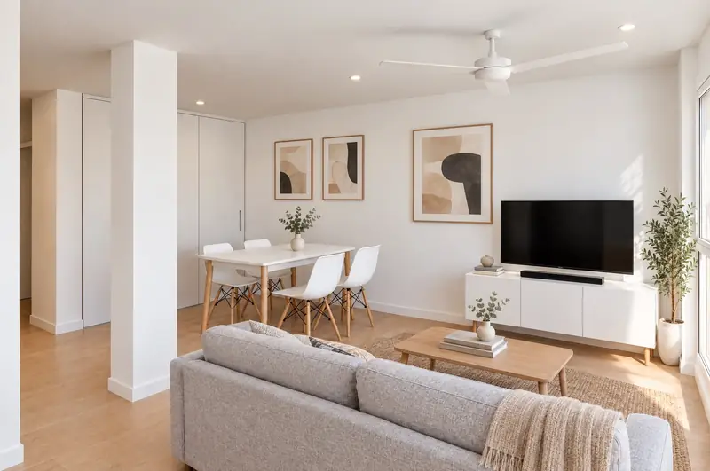 Salón con comedor y cocina abierta de una vivienda de una habitación